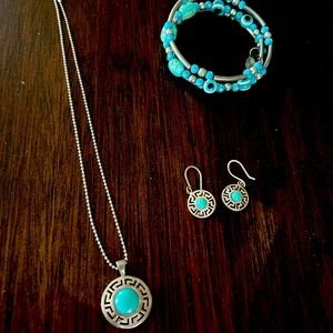 Beautiful silver and turquoise set bought while on vacation in Greece.